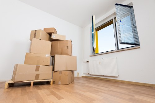 Family home move with packed boxes ready for local removals