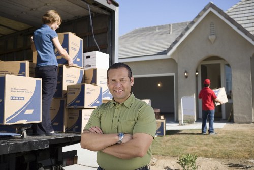 Expert packers handling fragile items in Beckenham