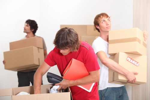 Packed boxes and furniture in a Beckenham storage unit